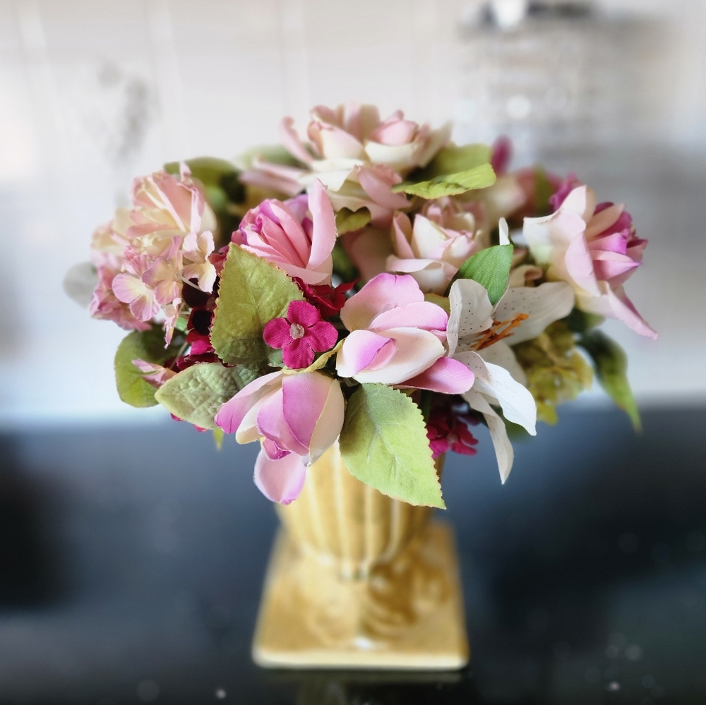 Beautiful faux flowers in vase